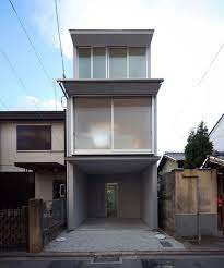 alphaville slots kyoto town house into a narrow residential plot